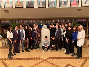 Senior curator-adviser Abenov Bolat Kusainovich with the curatorial group SIB-19-10 in the Auezov Theater. They visited the production of "100 jyldyq mahabbat"