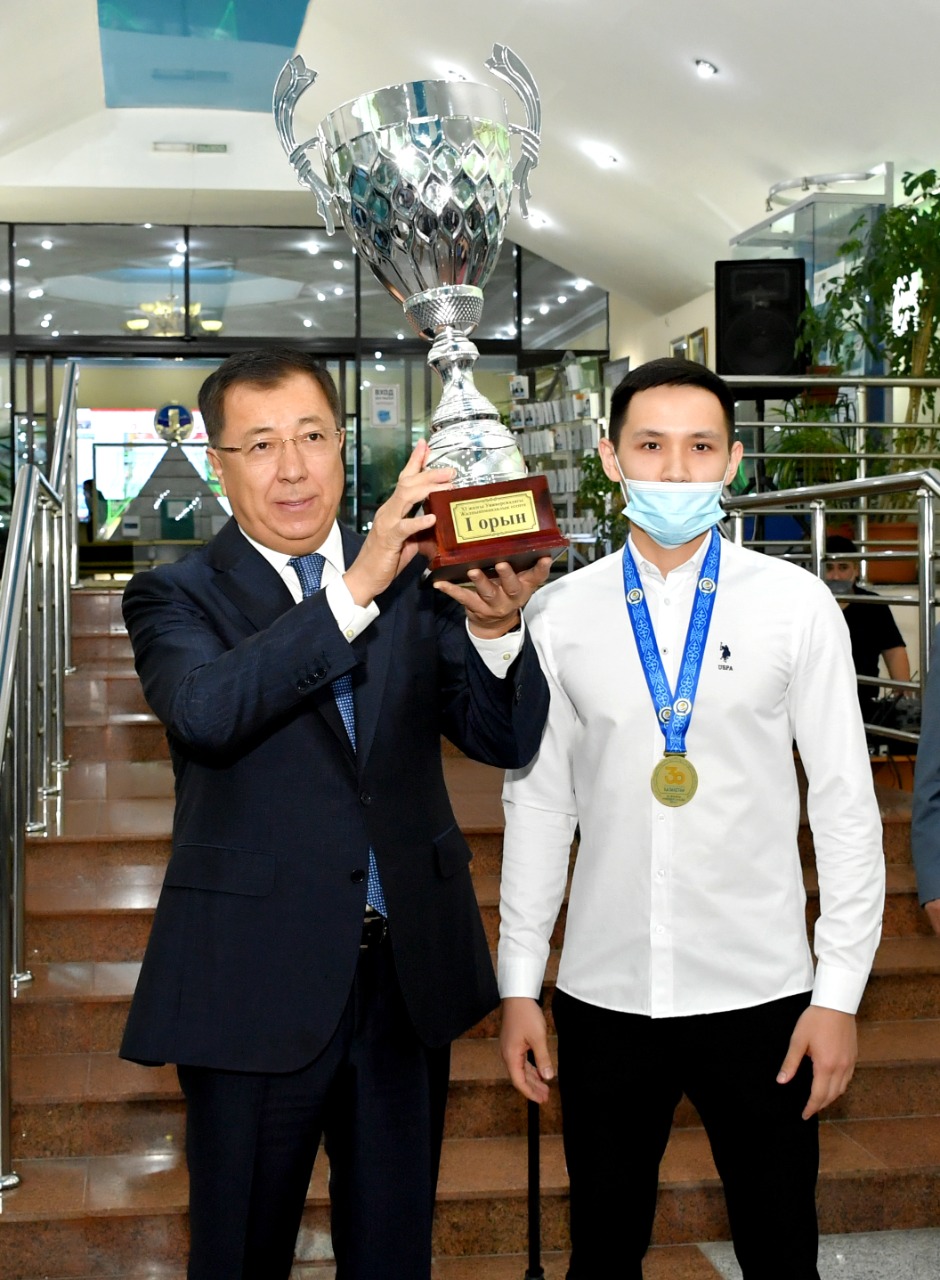 THE RECTOR HAS BEEN HANDED THE UNIVERSIADE CUP